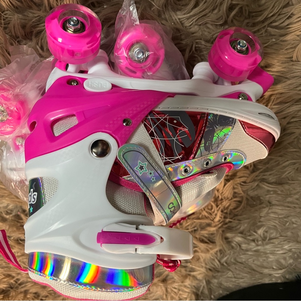 Pink and White Roller Skates with Holographic Accents